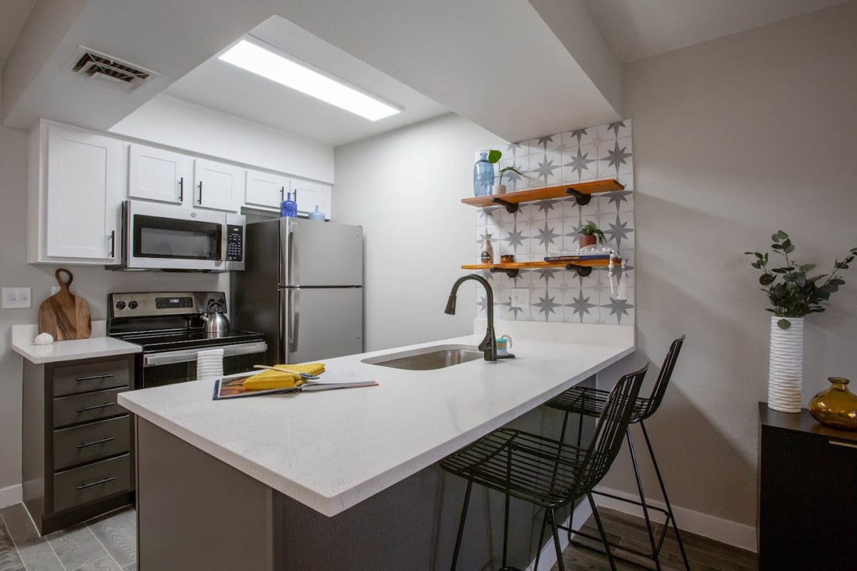 Apartment kitchen — representative home at Ascent 1829.