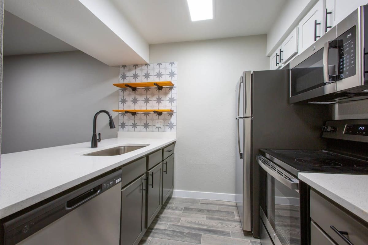Apartment kitchen — representative home at Ascent 1829.