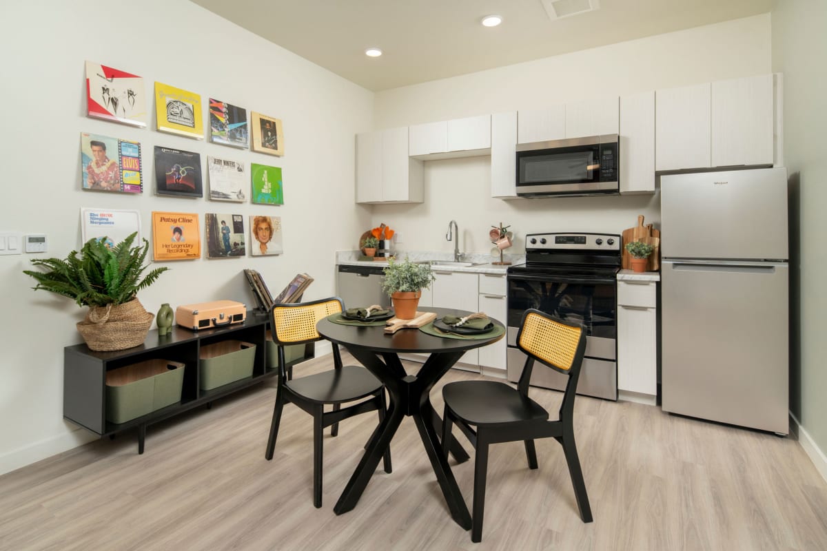 Furnished dining area shown — representative home at Streamliner 67th.