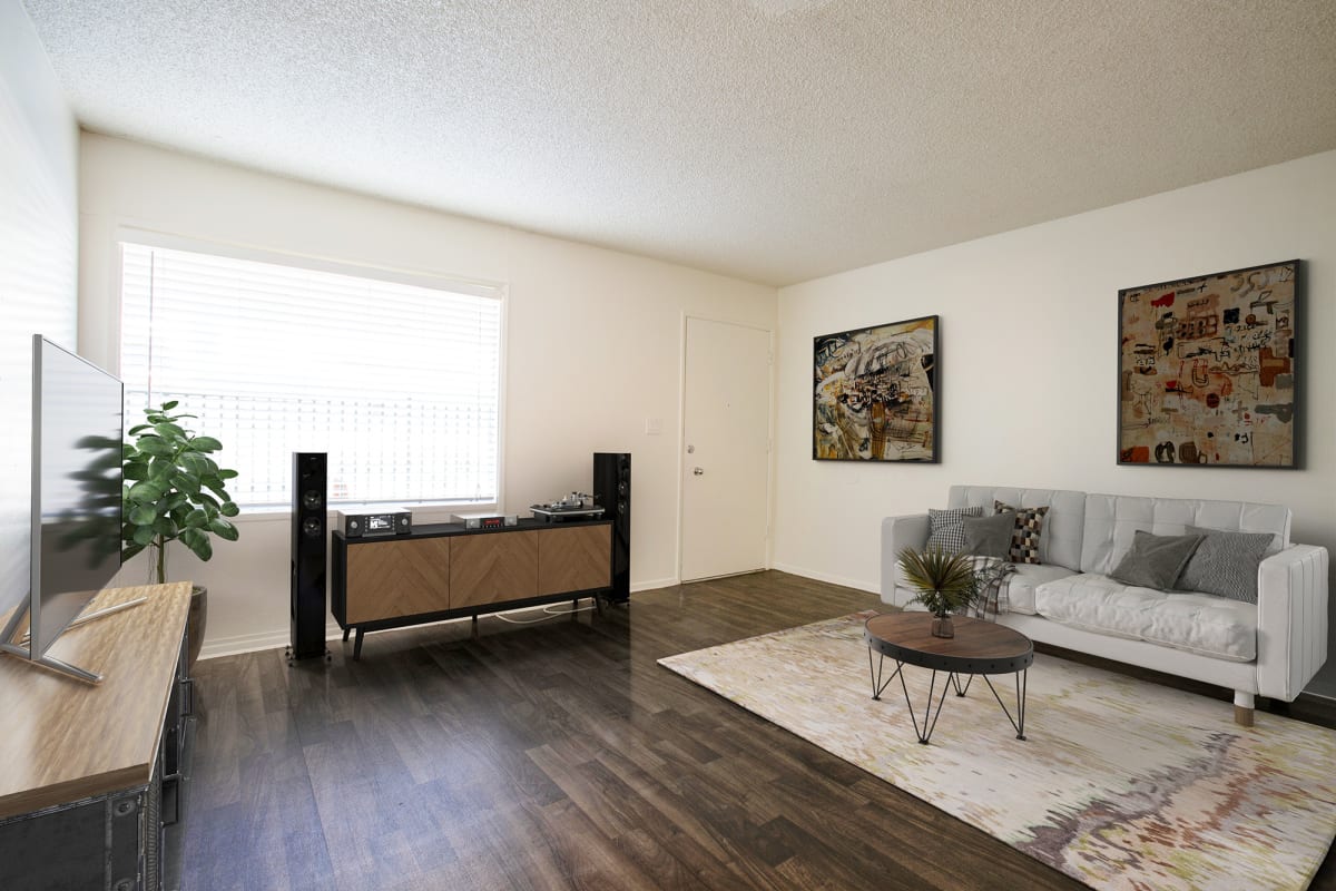Furnished apartment living area shown at The Continental.