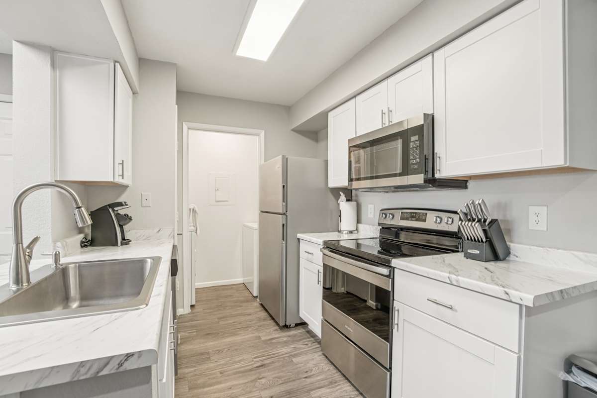 Apartment kitchen — representative home at Enclave at Paradise Valley.