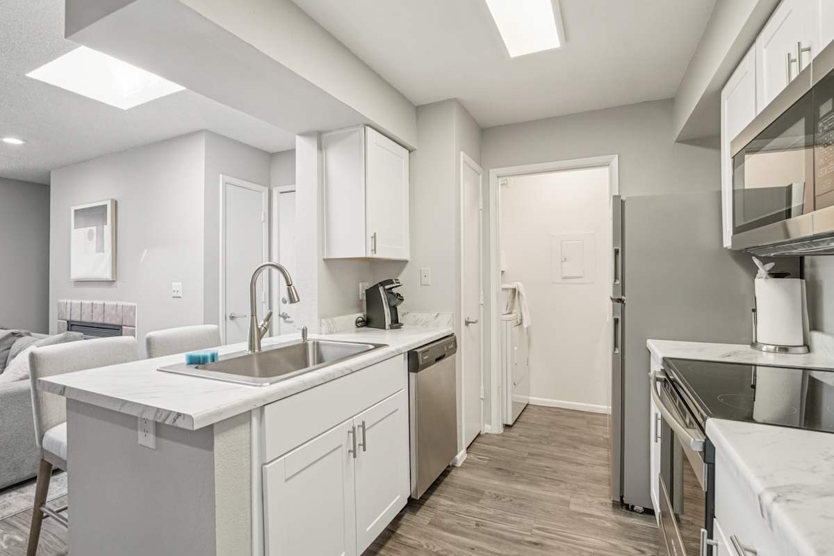 Apartment kitchen — representative home at Enclave at Paradise Valley.