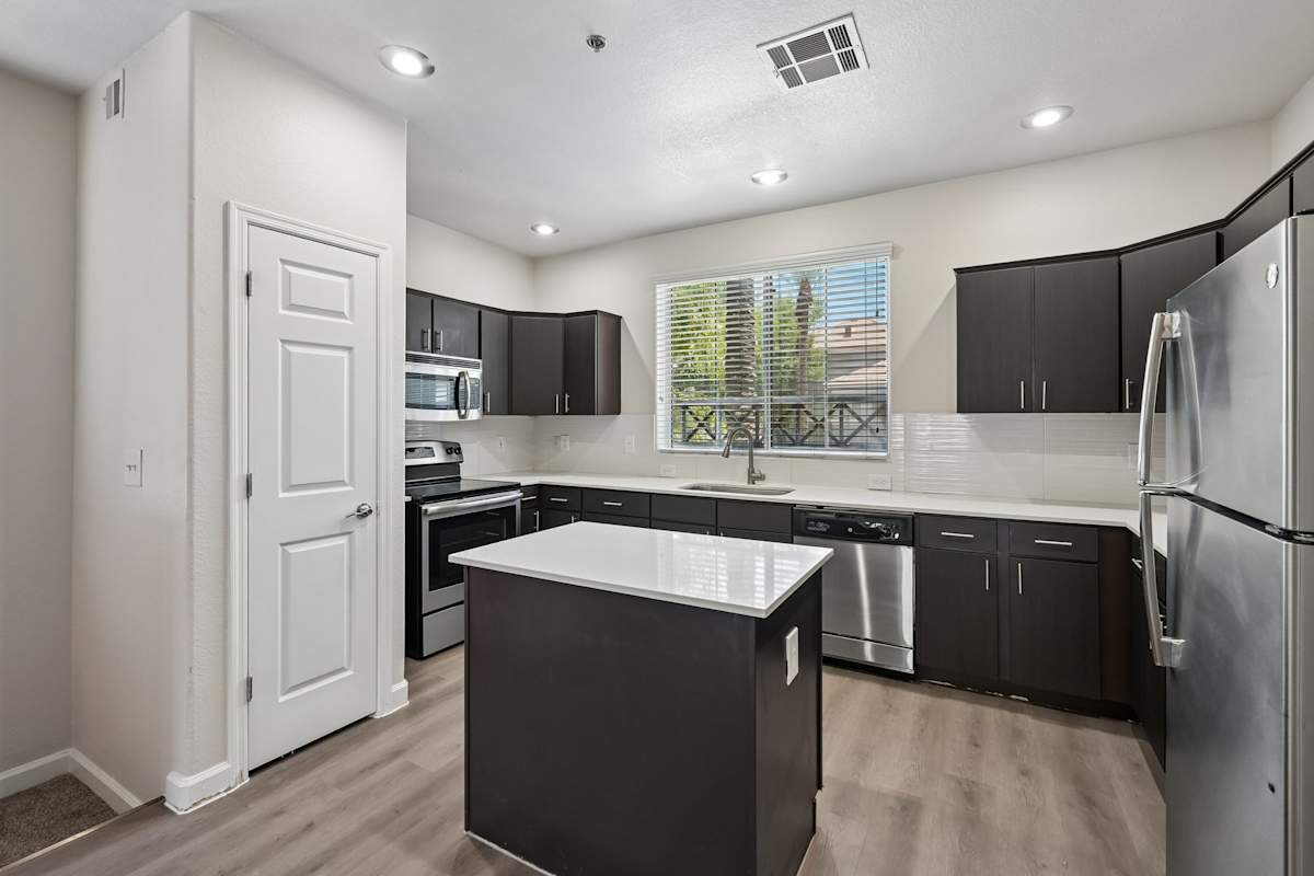 Apartment kitchen — representative home at The Highland.