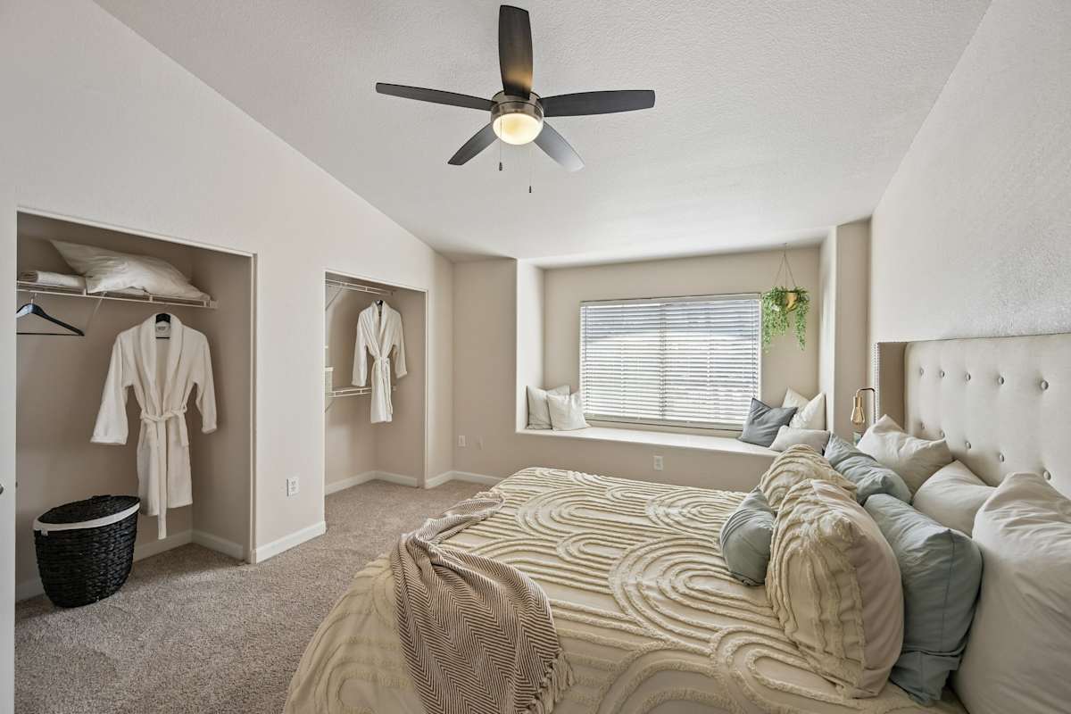 Furnished bedroom shown — representative home at The Highland.