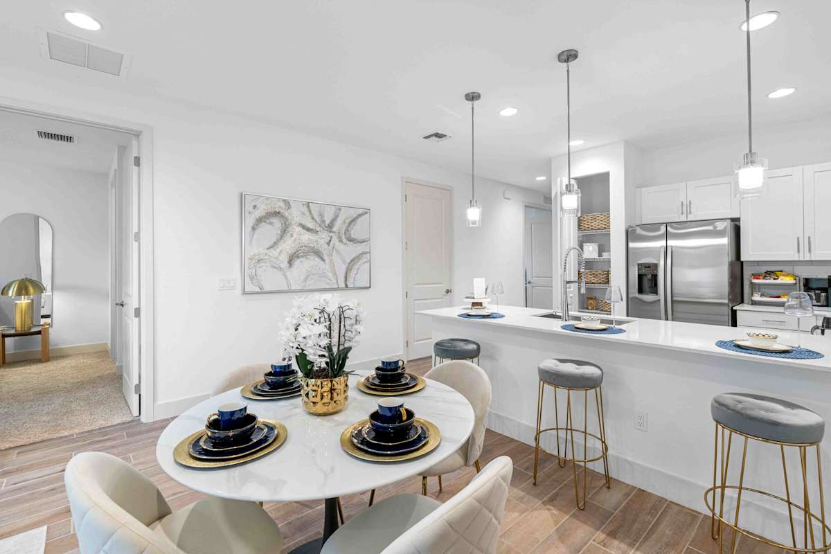 Solera at Avalon Trails model kitchen and dining area - Delray Beach, FL