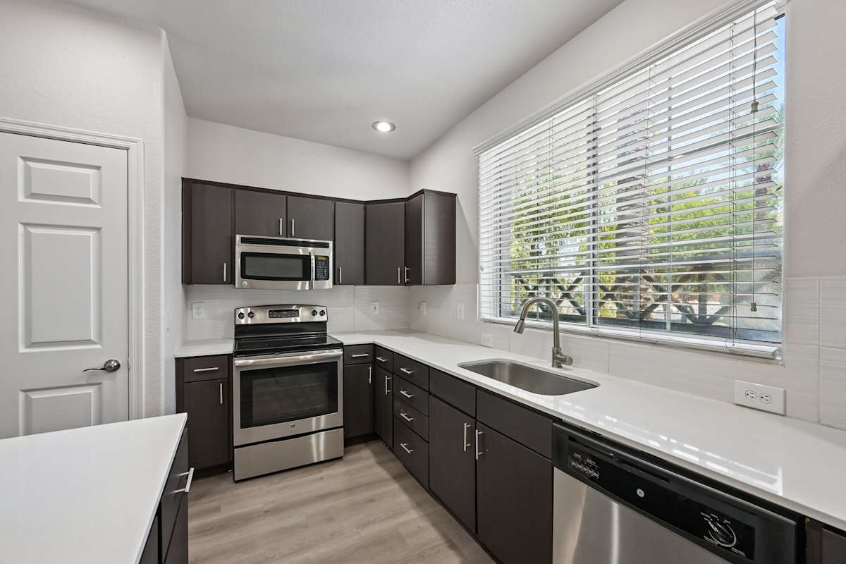 Apartment kitchen — representative home at The Highland.