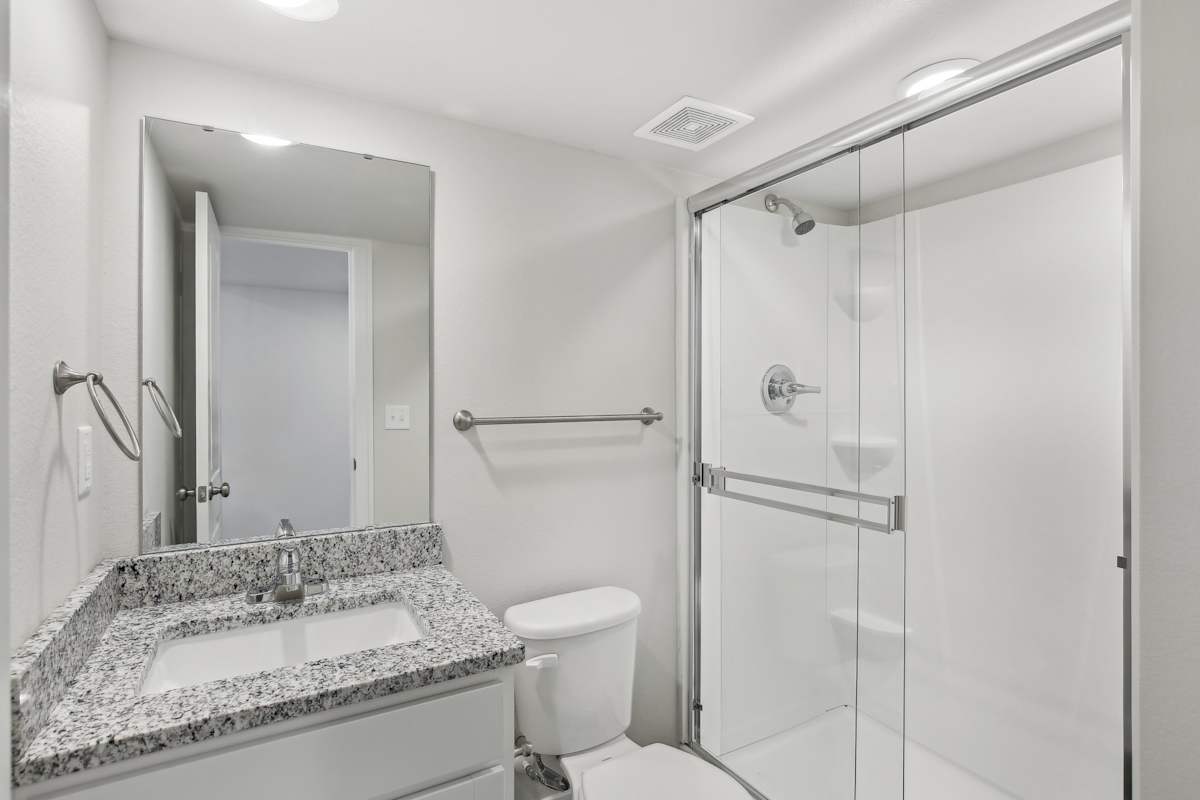 Chapman Ridge Townhomes bathroom with shower - Blue Springs, MO