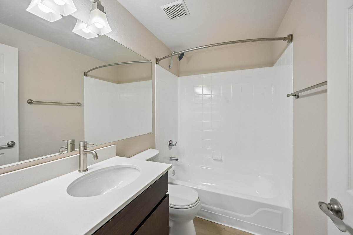 Apartment bathroom — representative home at The Highland.