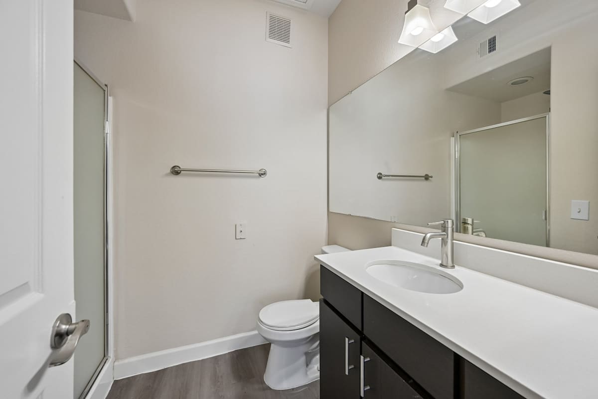 Apartment bathroom — representative home at The Highland.