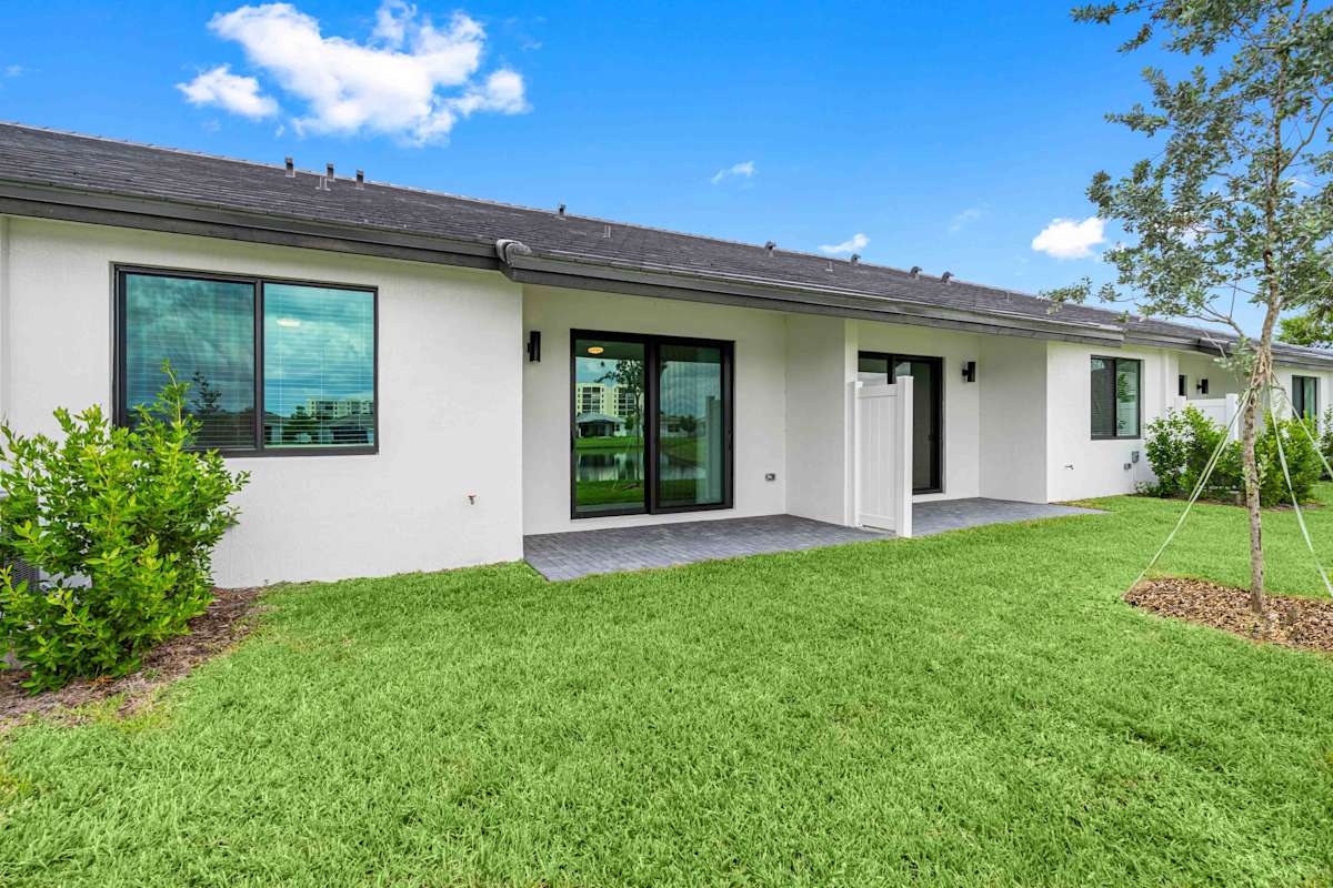 Solera at Avalon Trails exterior home front with lawn - Delray Beach, FL
