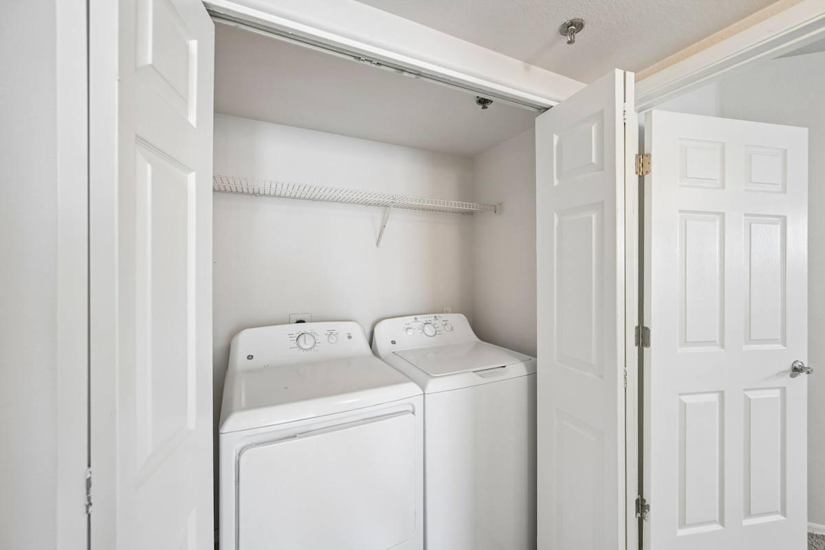 In-home laundry area — representative home at The Highland.