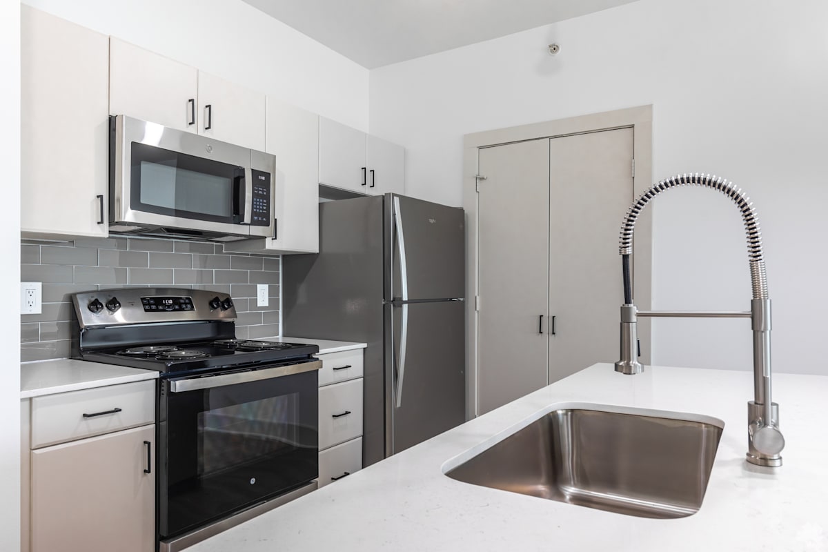 5225 Maple Avenue kitchen with stainless appliances - Dallas, TX
