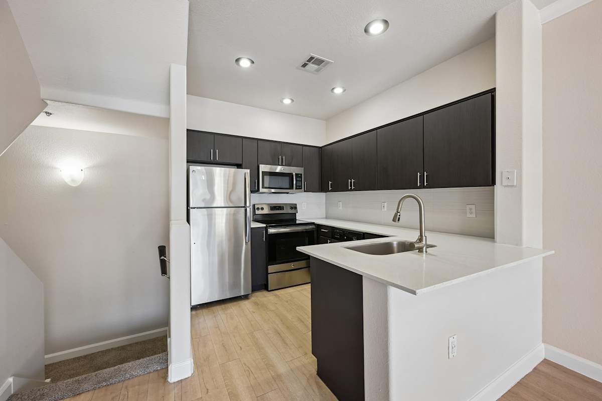 Apartment kitchen — representative home at The Highland.
