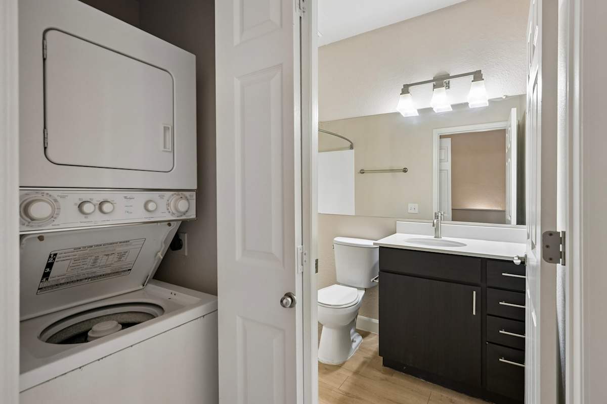 In-home laundry area — representative home at The Highland.
