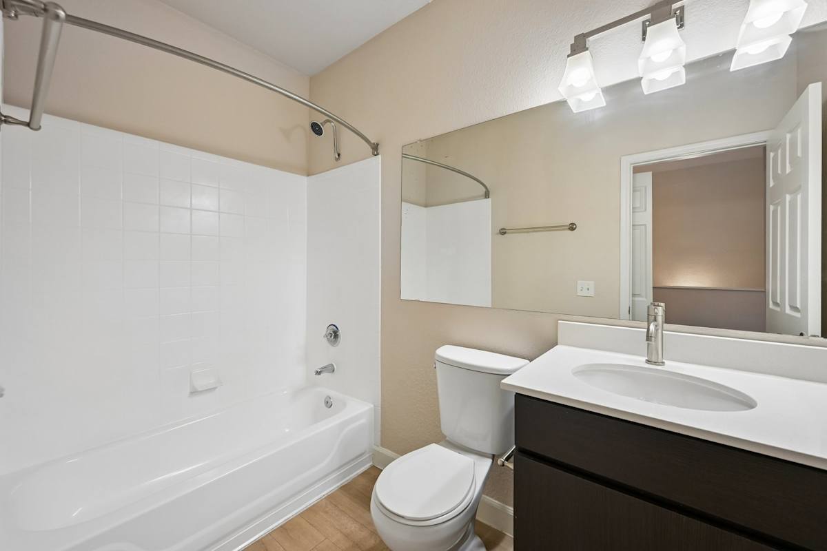 Apartment bathroom — representative home at The Highland.