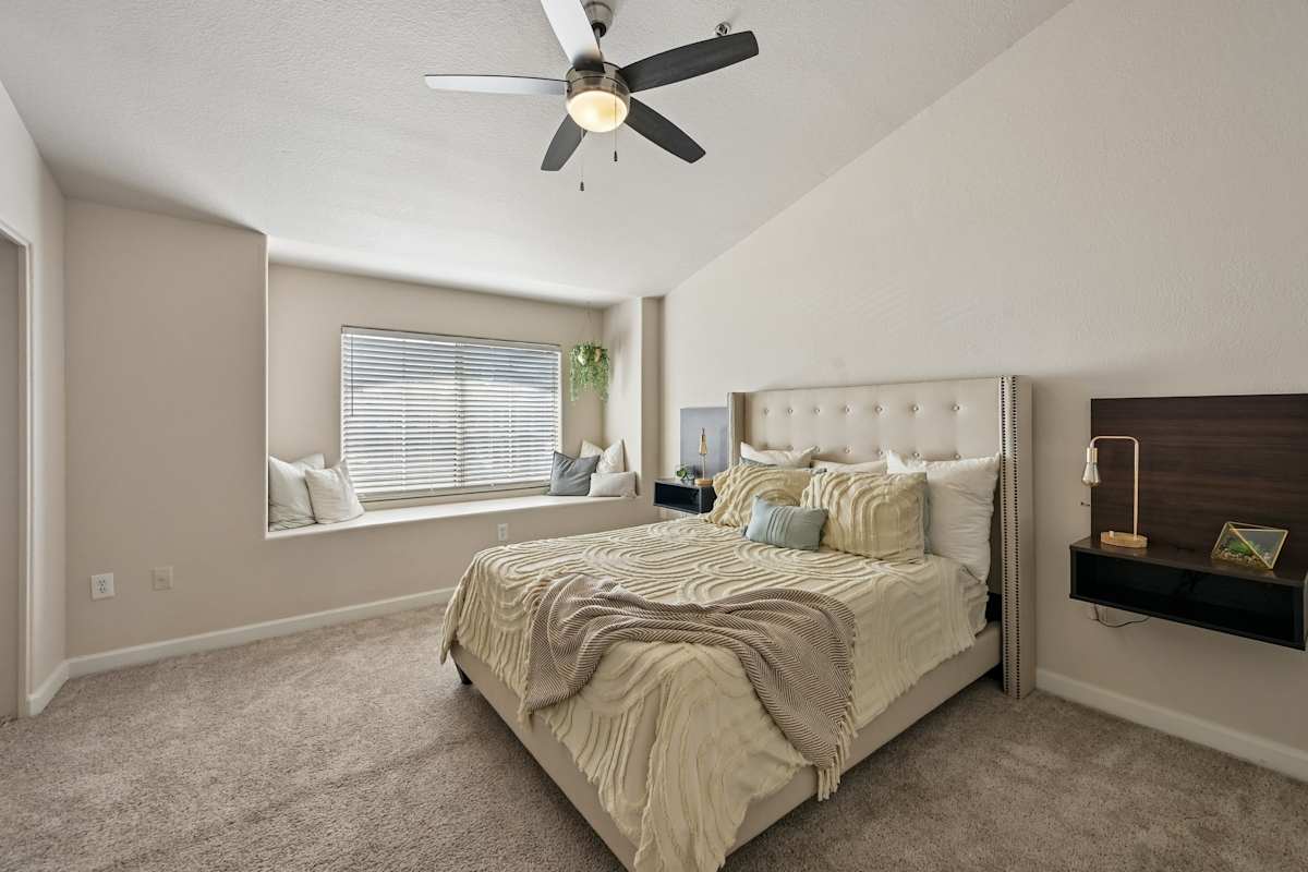 Furnished bedroom shown — representative home at The Highland.