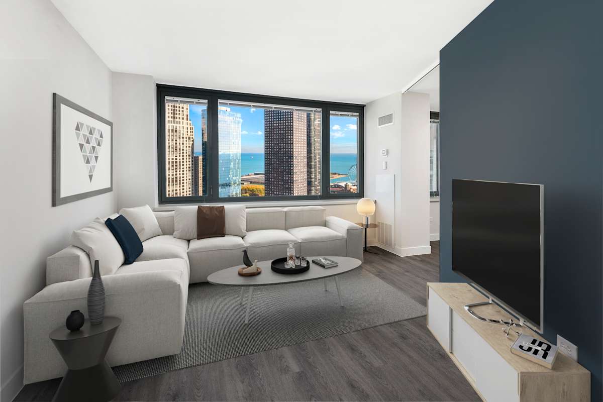 Cityfront Place living room with city views - Chicago, IL