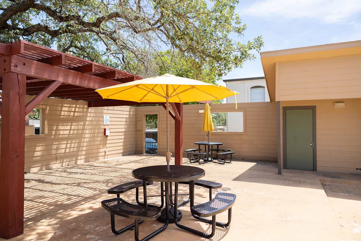 Oak Terrace outdoor patio table with umbrella - San Antonio, TX