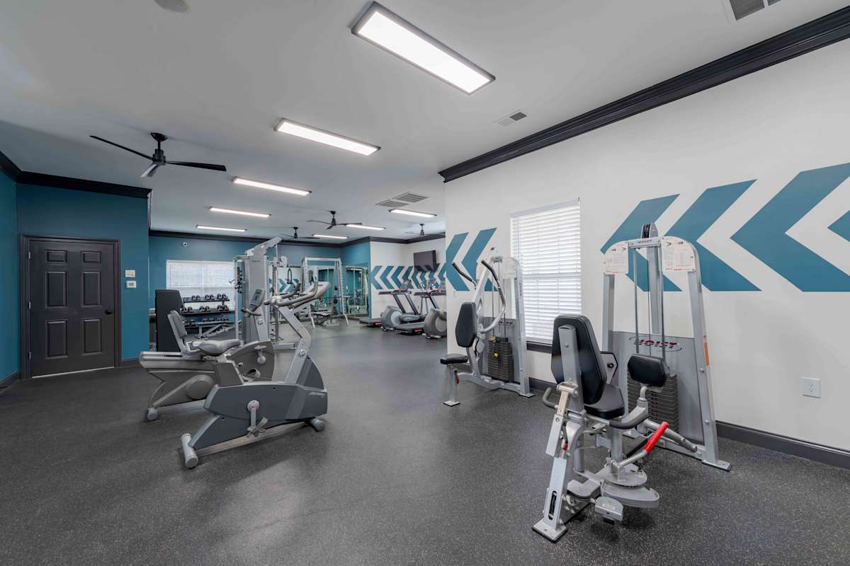 Reserve at Carrington Place fitness center with cardio and weights - Fayetteville, NC