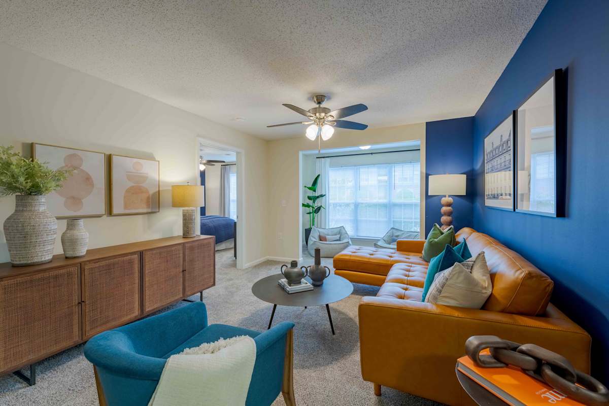 Reserve at Carrington Place apartment living room seating area - Fayetteville, NC