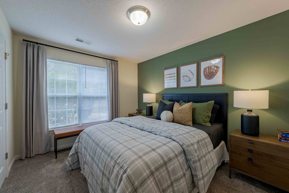 Reserve at Carrington Place apartment bedroom with window - Fayetteville, NC