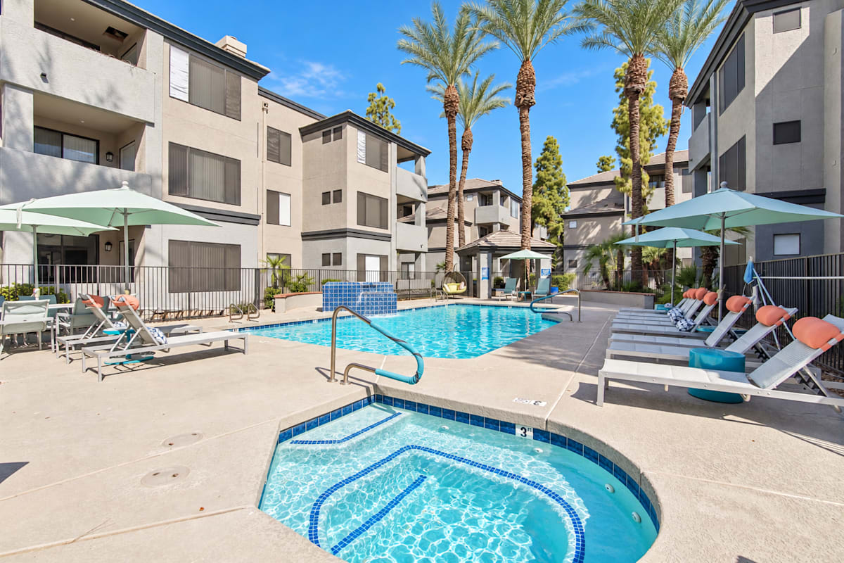 Pool and poolside area at Ingleside Apartments.
