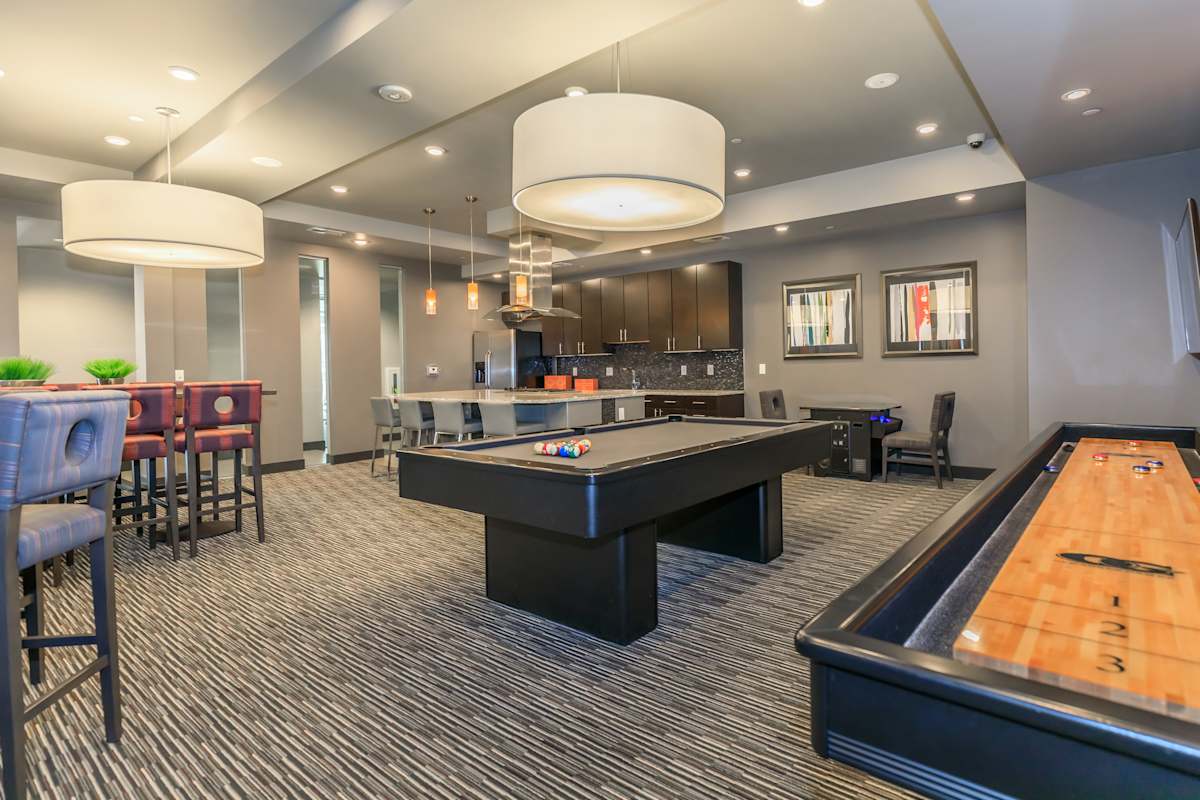 Lofts at Lincoln Station game room with pool table and bar - Lone Tree, CO