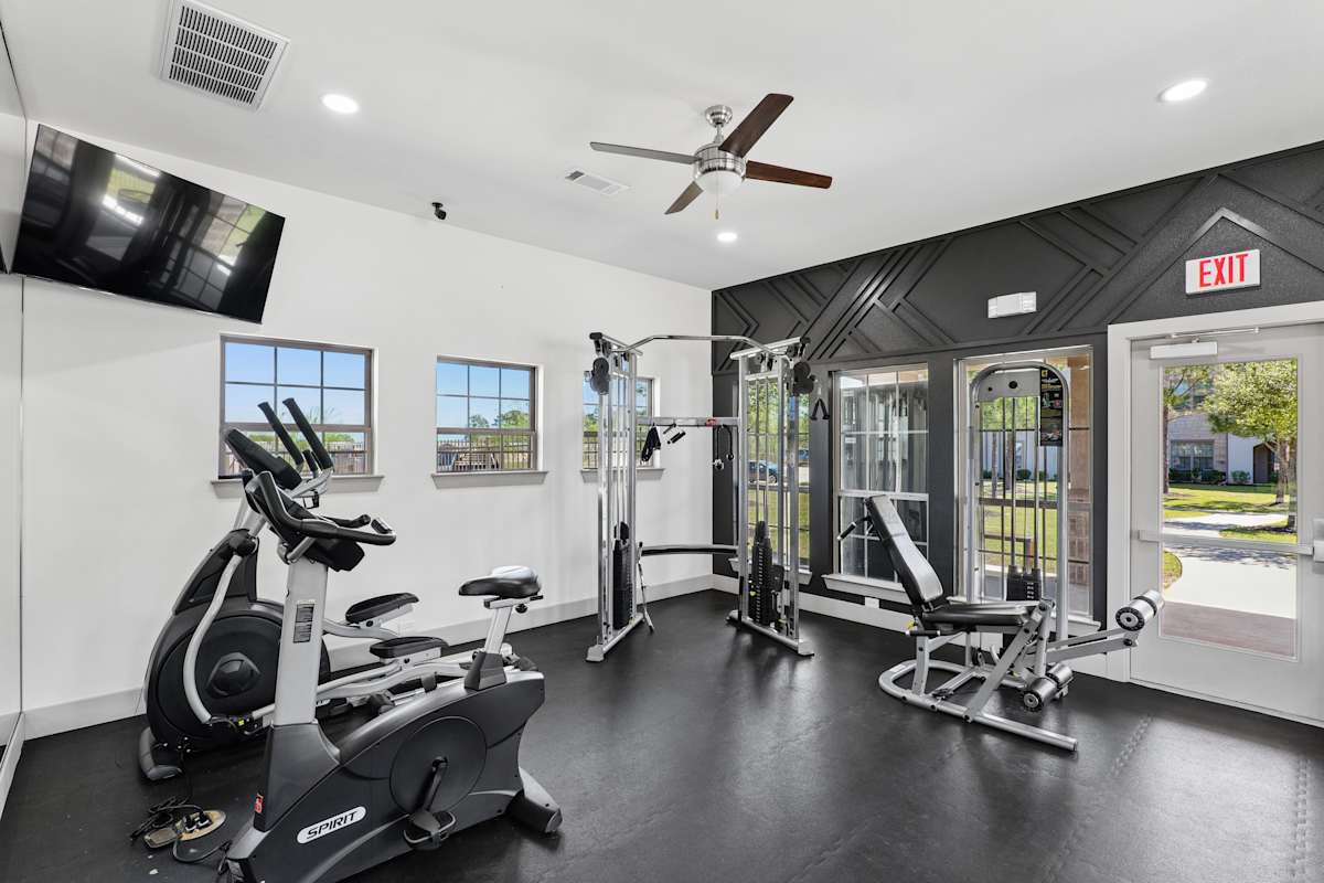 Capri Villas at the Lake fitness center with cardio equipment - Conroe, TX