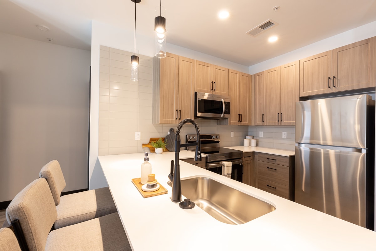 North End Apartments kitchen with quartz countertops - Carmel, IN