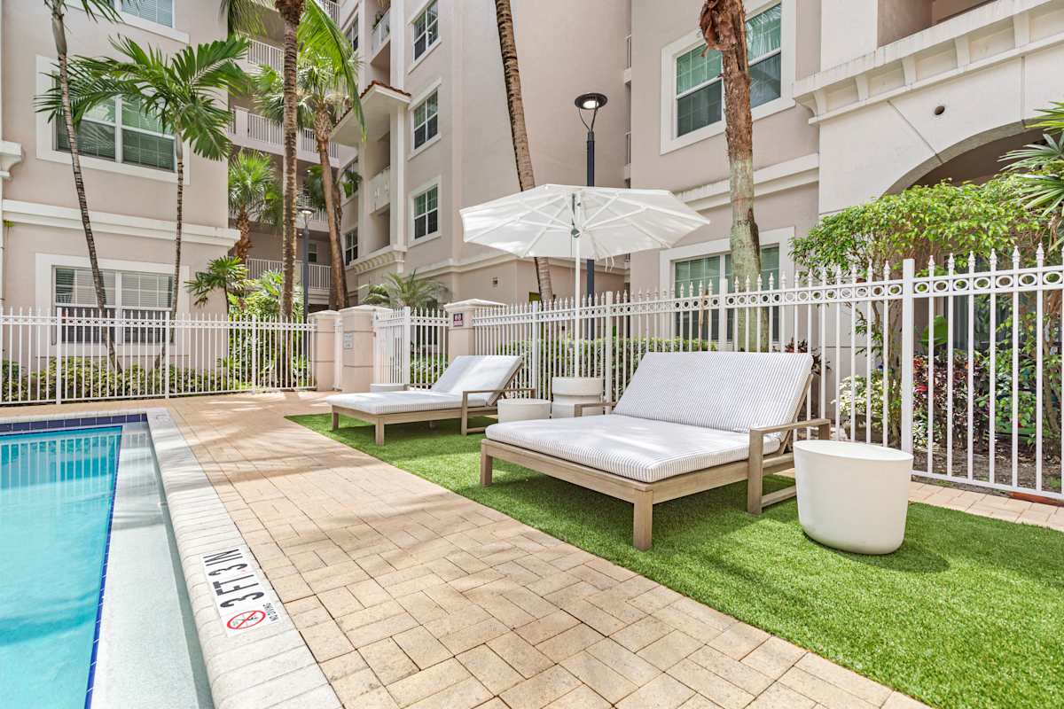 Monteverde at Renaissance Park pool with lounge chairs - Boyton Beach, FL