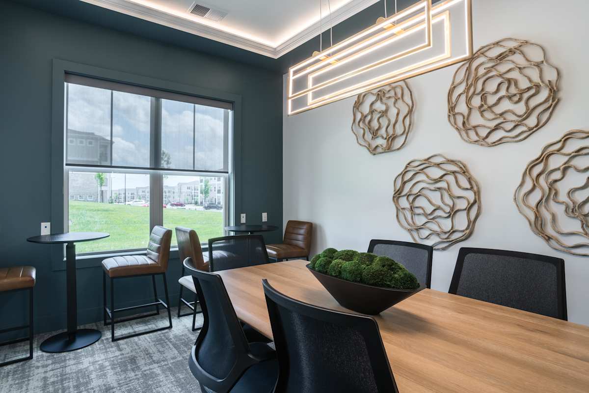 Nexus 485 meeting room with table and wall art - Charlotte, NC