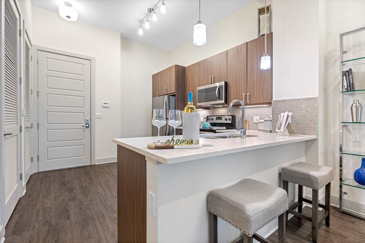 Ora Flagler Village apartment kitchen with island - Ft Lauderdale, FL