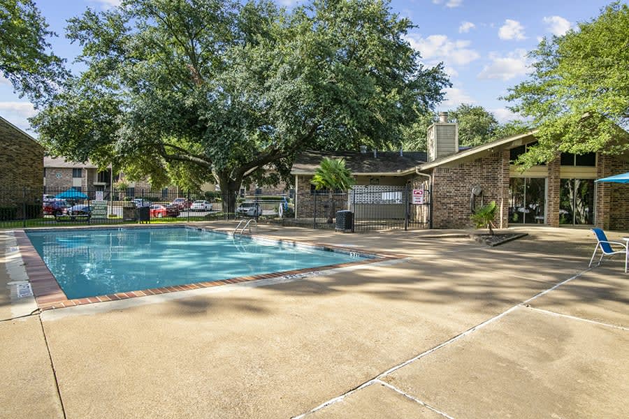 Artwood Apartment Homes pool deck view - Tyler, TX