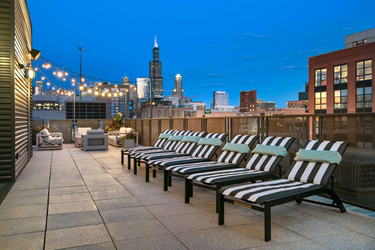 13thirteen Randolph Street Lofts rooftop lounge chairs with city view - Chicago, IL
