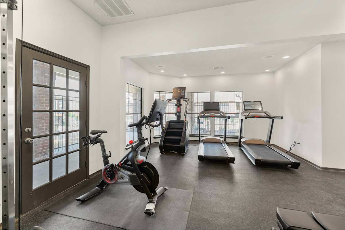Silverwood Apartments fitness center with cardio equipment - Mission, KS