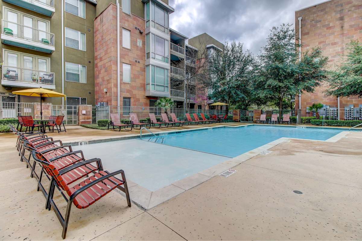 HemisView Village poolside seating at the pool - San Antonio, TX