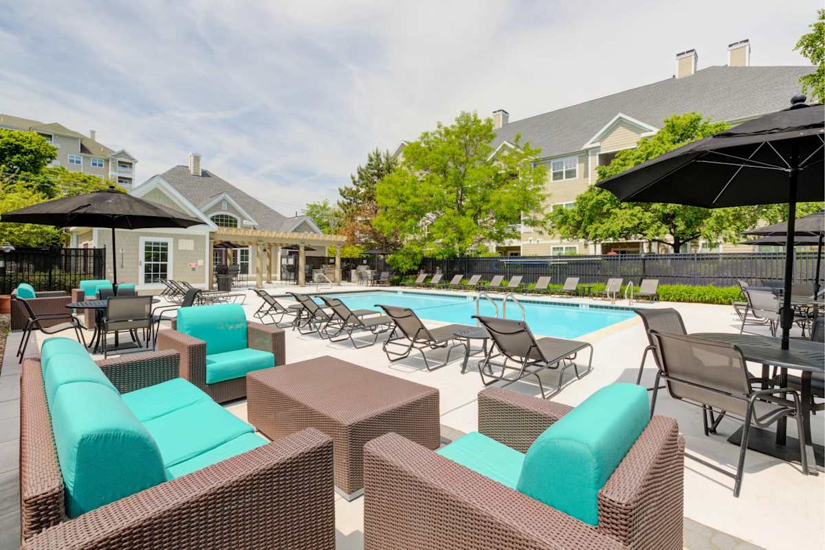 Hawthorne Commons pool deck with loungers and umbrellas - Salem, MA