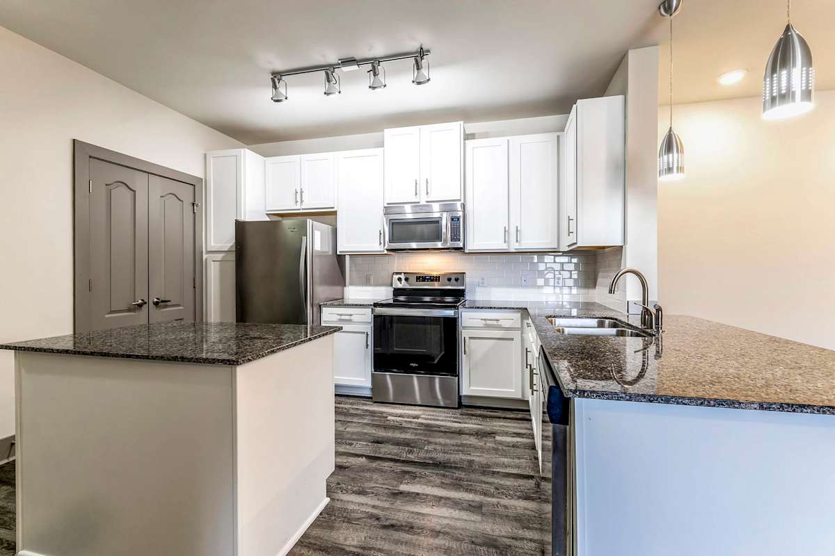 The Summit at Nashville West apartment kitchen with stainless steel appliances - Nashville, TN