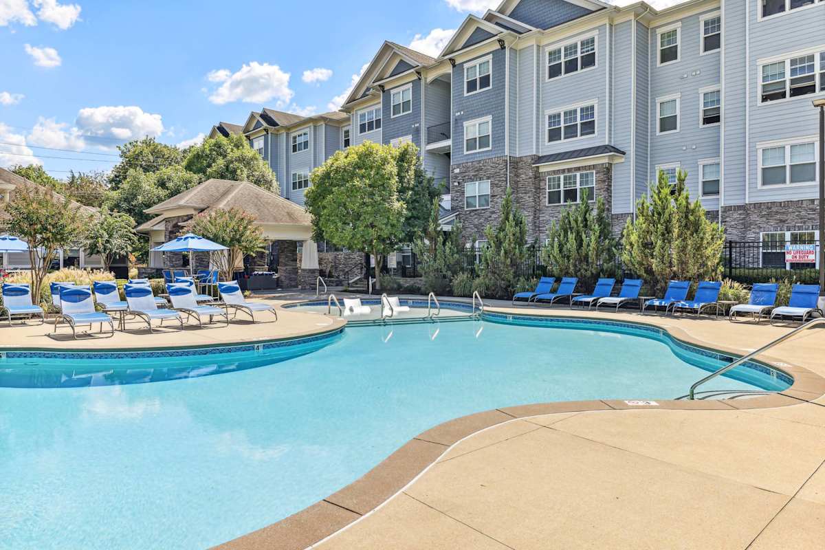 The Summit at Nashville West pool surrounded by apartment buildings - Nashville, TN