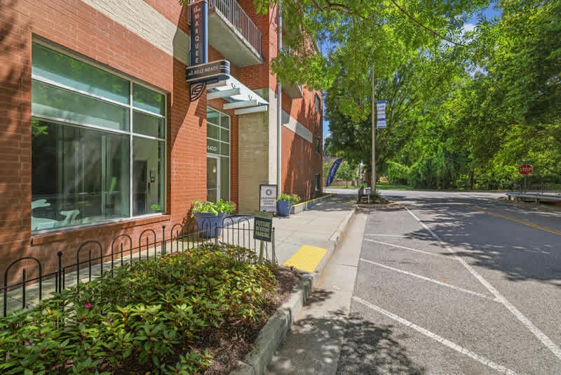 The Marquee at Belle Meade Apartments exterior parking area and sign - Nashville, TN