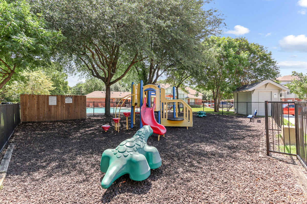 Flats at Five Mile Creek playground with slides - Dallas, TX