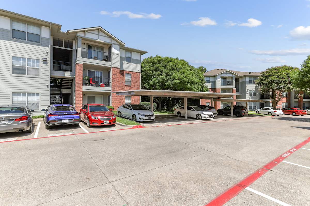 Flats at Five Mile Creek parking lot and buildings - Dallas, TX