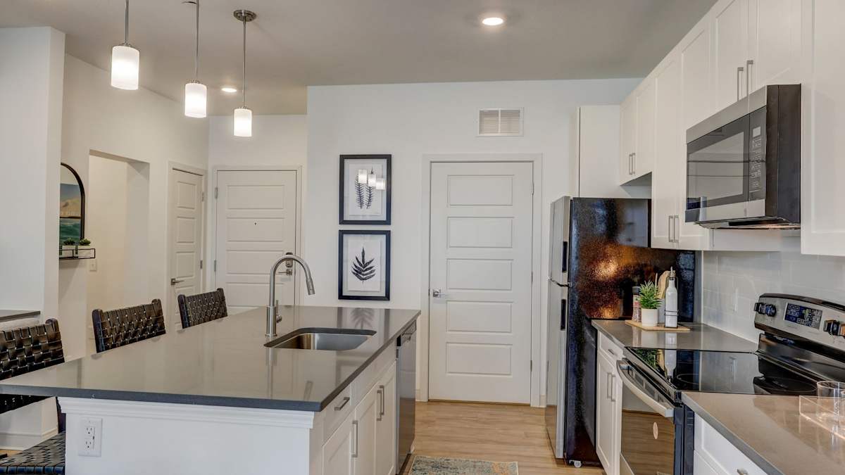 The Artisan at Robinson apartment kitchen with stainless steel appliances - Pittsburgh, PA