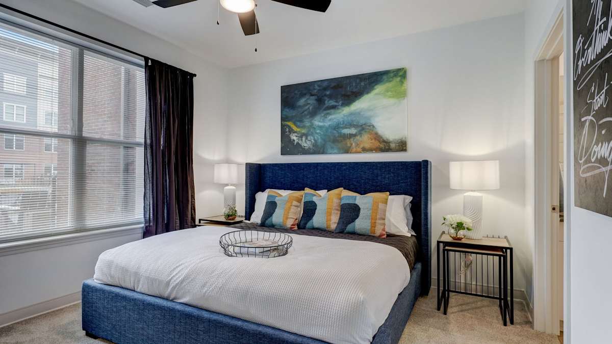 The Artisan at Robinson bright apartment bedroom with large window - Pittsburgh, PA