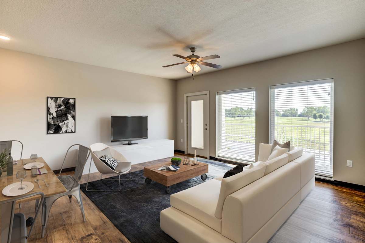 Fairway Flats & The Heights at Fairway Flats living room with large windows - Lawrence, KS