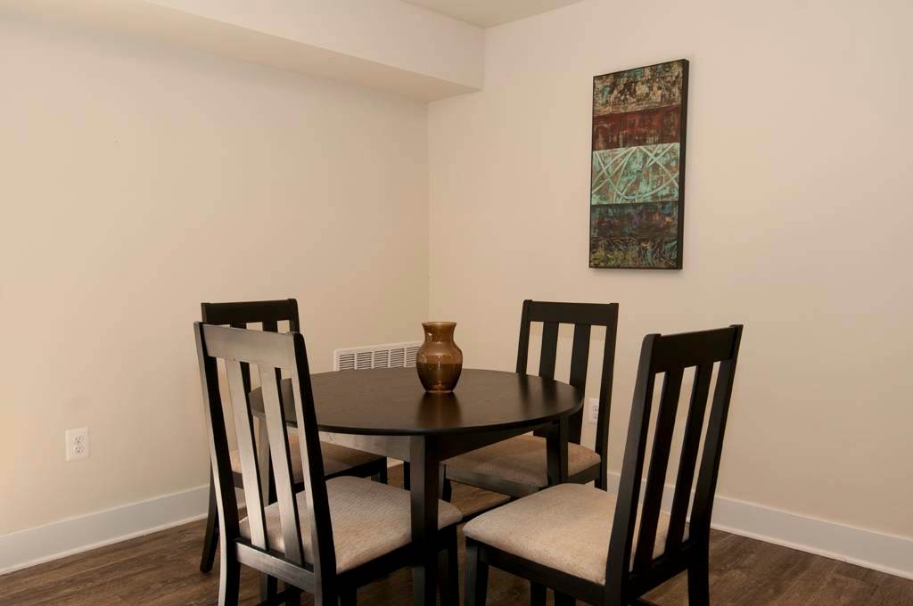 Auden Place dining area with table and chairs - Silver Spring, MD