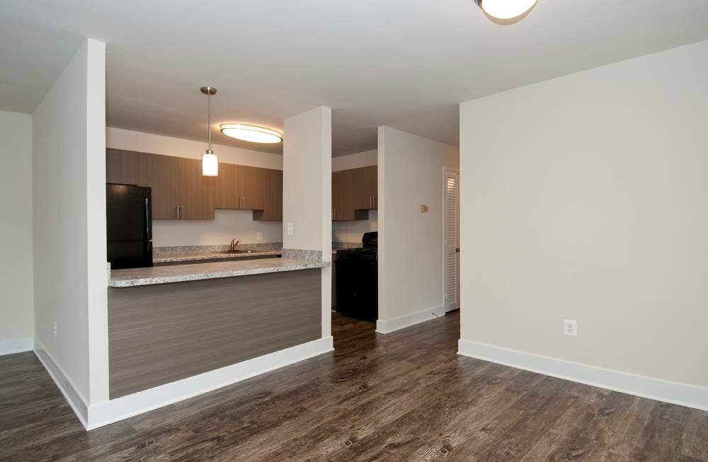 Auden Place kitchen with cabinets and counter - Silver Spring, MD