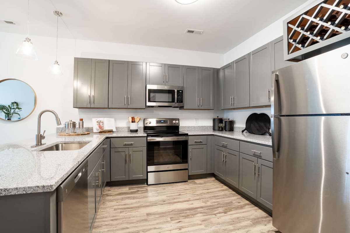 4 Farms at Horse Pen Creek kitchen with stainless appliances - Greensboro, NC