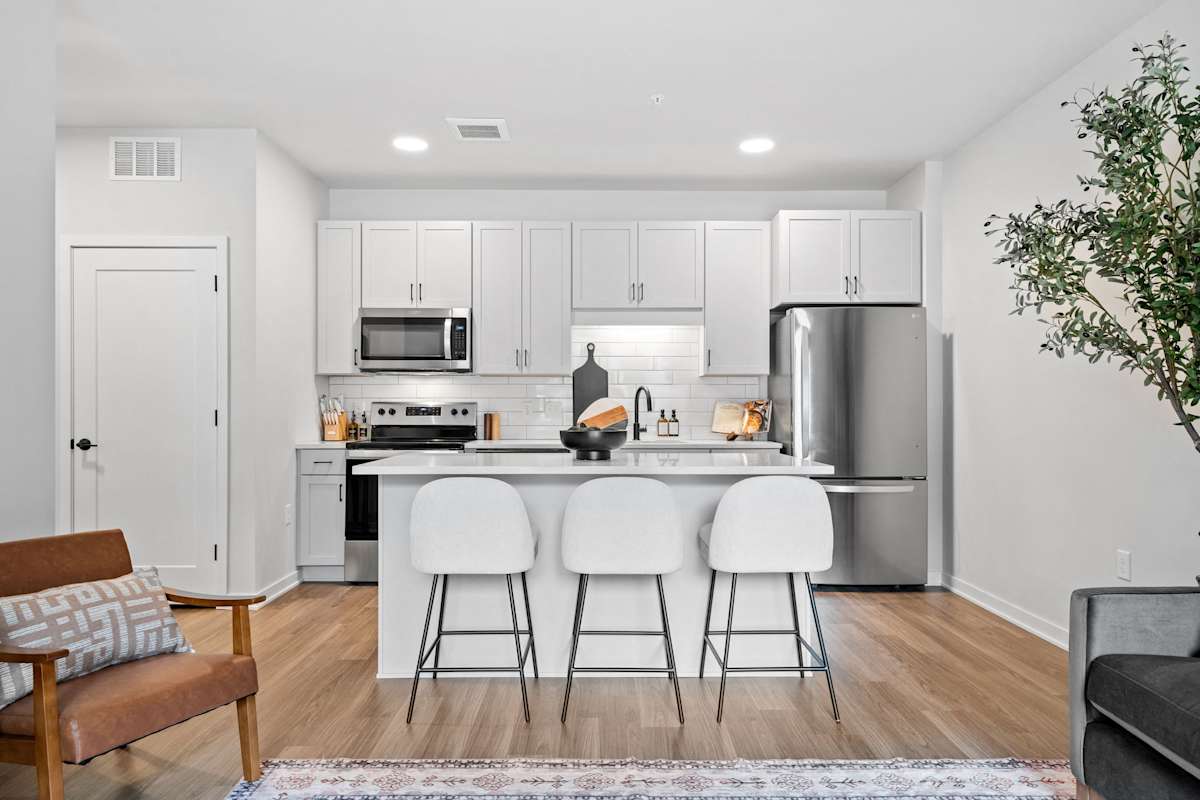 Corsa apartment kitchen with white cabinets - St. Louis Park, MN
