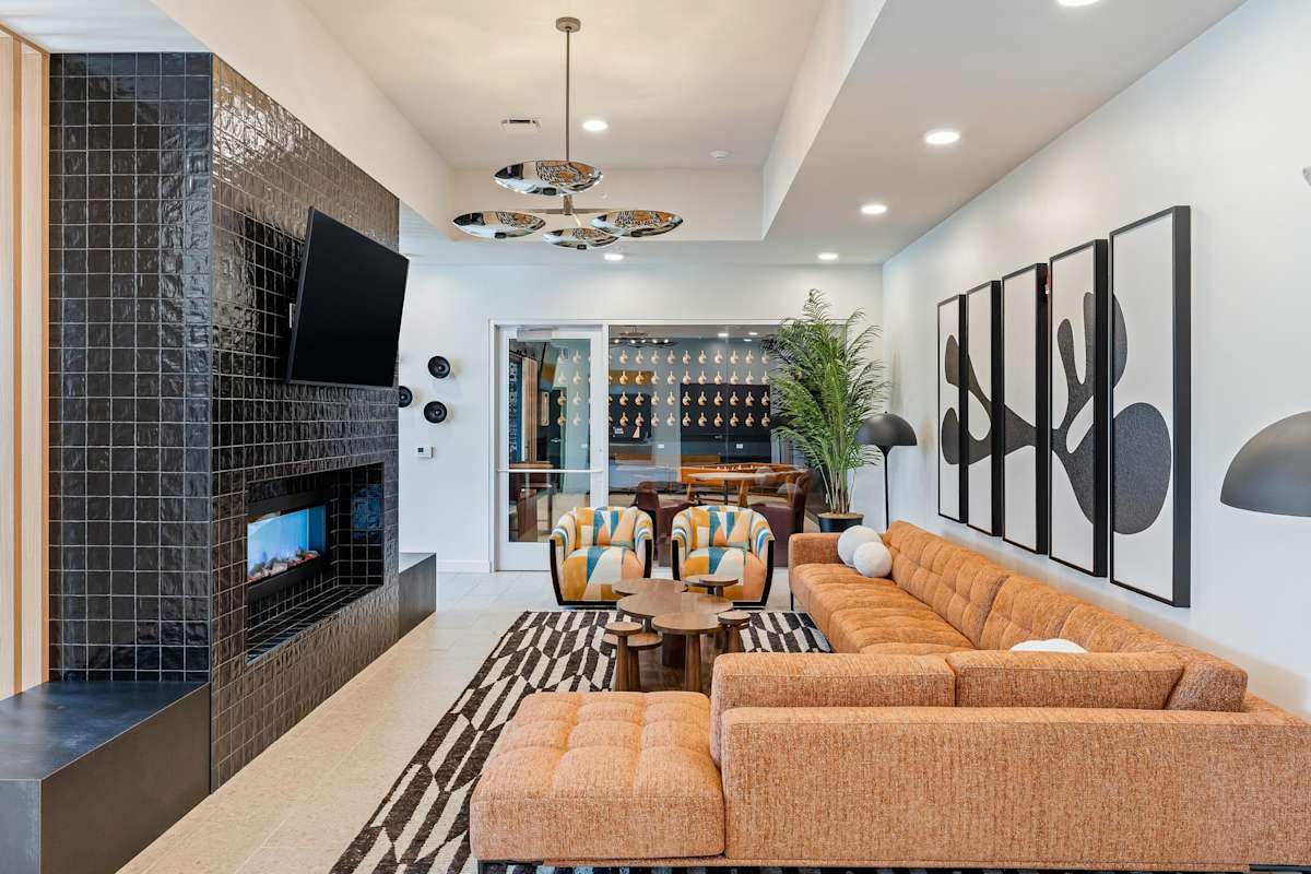 Brookside Commons resident lounge with fireplace - Kansas City, MO